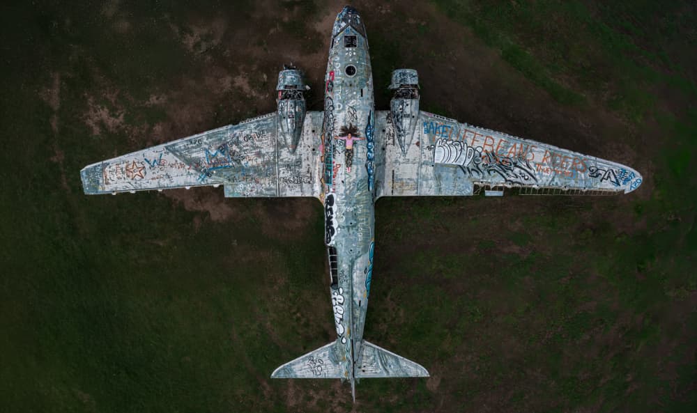 Abandoned Plane Graffiti by Srecko Jubic — canvas wall art