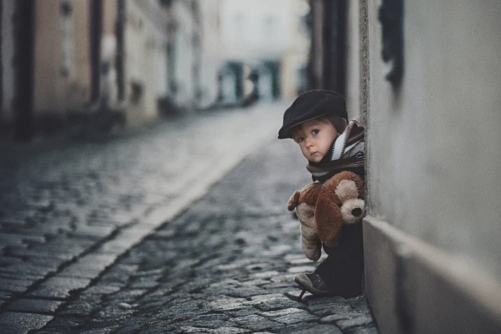 Shy Child With Teddy by Tatyana Tomsickova — canvas wall art
