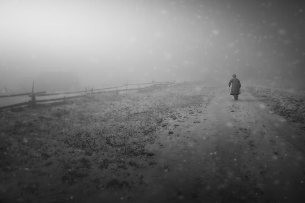 Lone Figure Winter Path by Martin Marcisovsky — canvas wall art