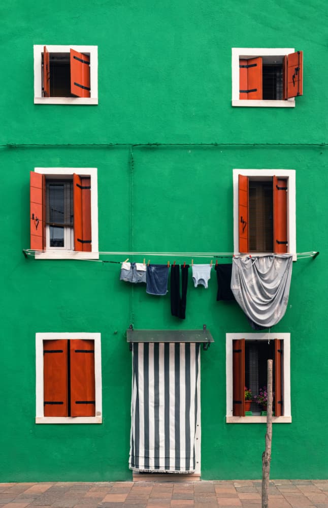 Vibrant Green House Facade by Karim Al Thahaby — canvas wall art