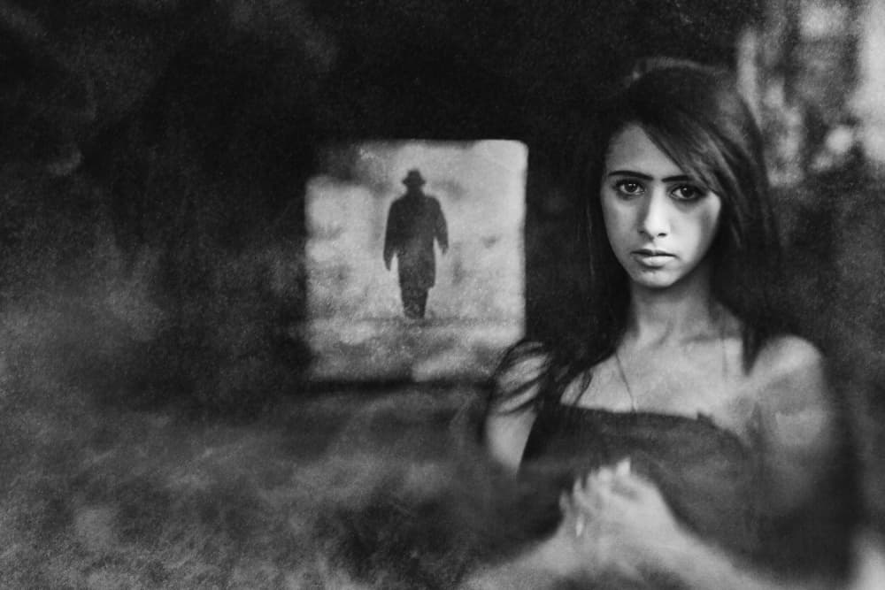 Haunted Gaze Shadowy Figure by Jay Satriani — canvas wall art