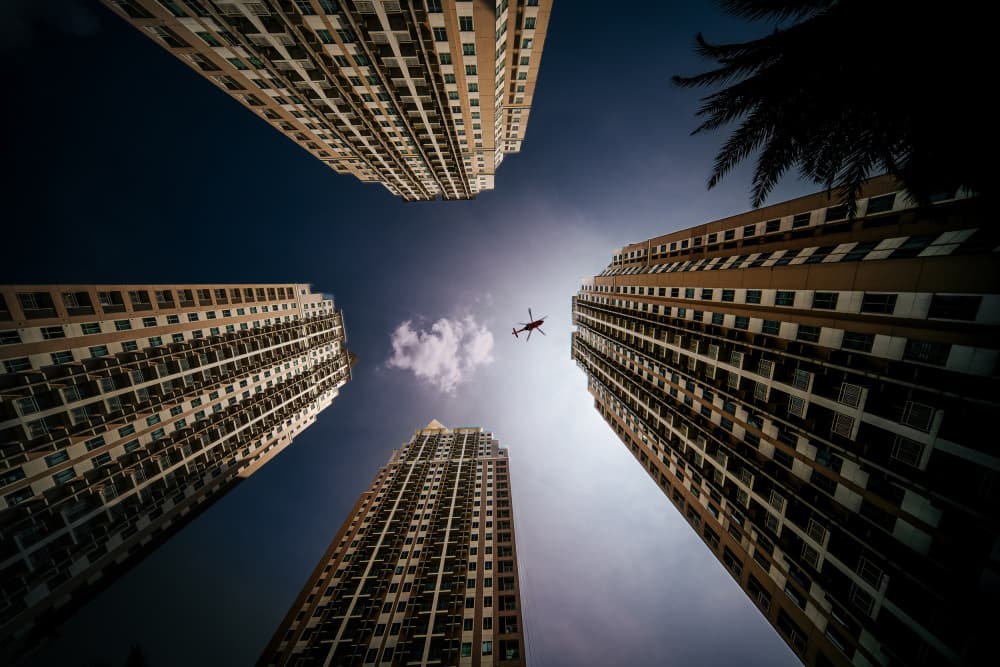 Helicopter Over Skyscrapers by Martin Wong — canvas wall art