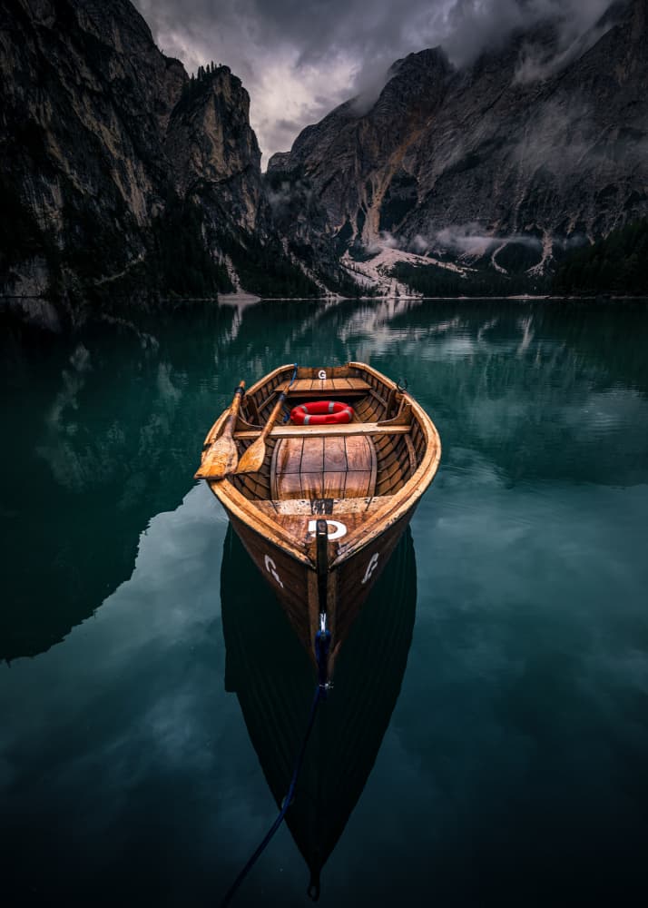 Moody Lake Rowboat by Marco Tagliarino — canvas wall art
