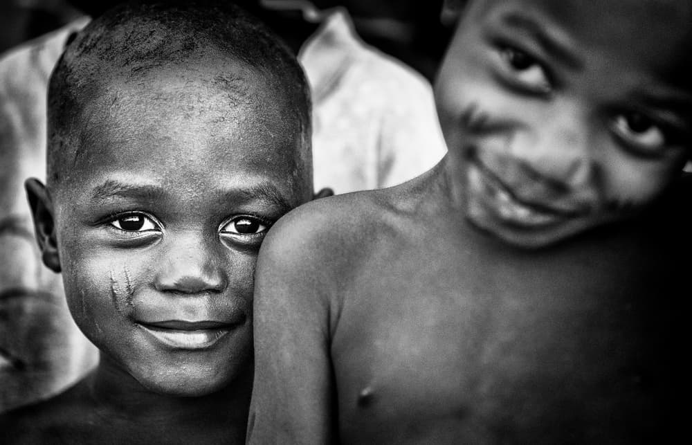 Smiling Boys Portrait by Joxe Inazio Kuesta Garmendia — canvas wall art