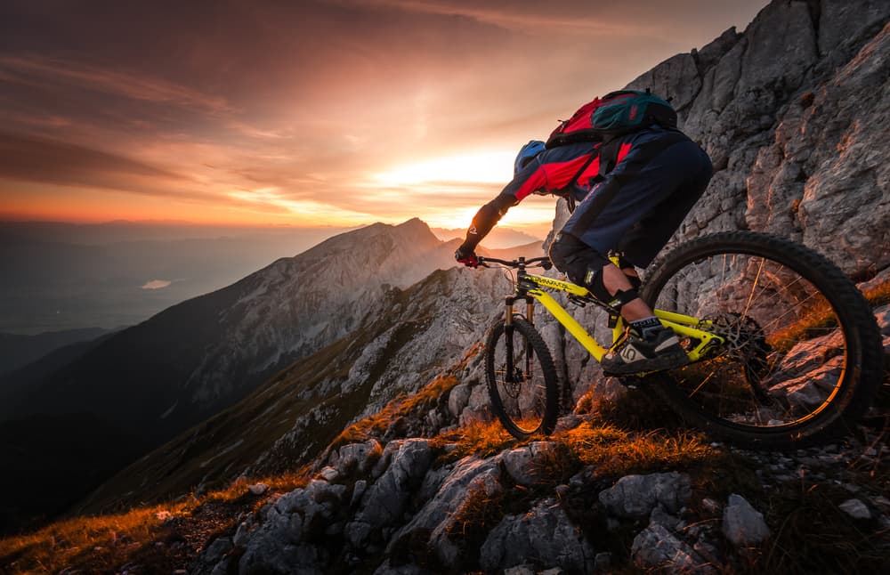 Epic Mountain Biking Sunset by Sandi Bertoncelj — canvas wall art