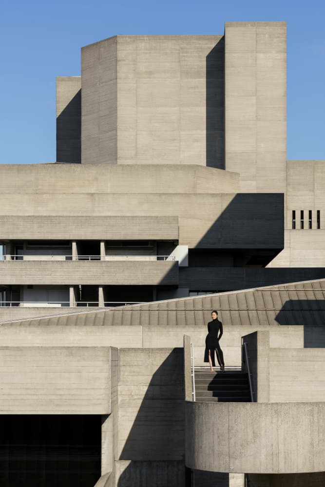 Woman in Brutalist Architecture by Minorstep — canvas wall art