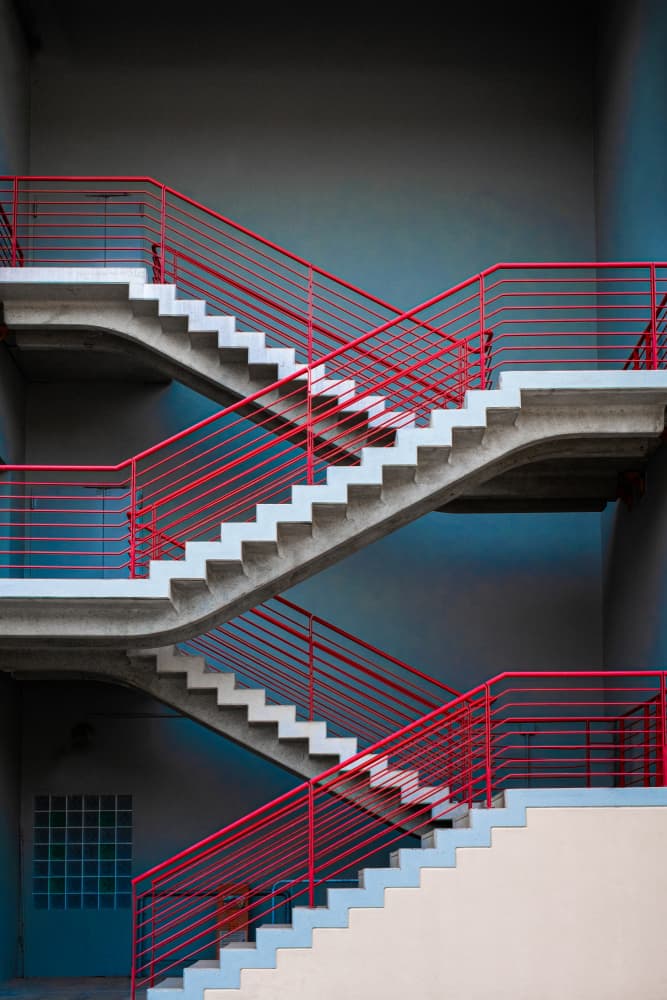 Striking Red Stairs by Giorgio Toniolo — canvas wall art