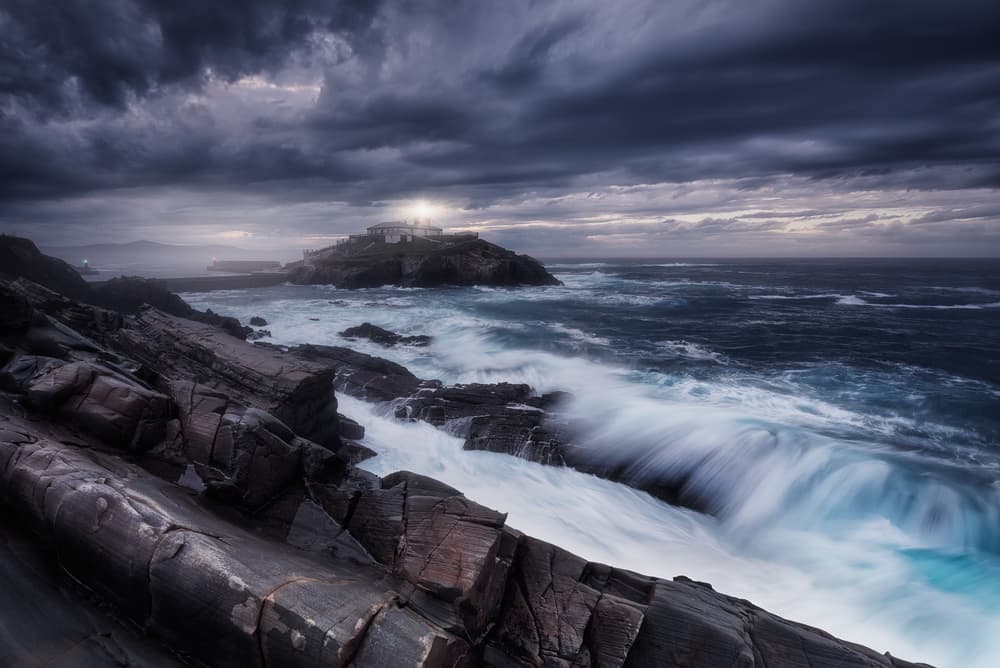 Dramatic Coastal Lighthouse by Carlos F. Turienzo — canvas wall art