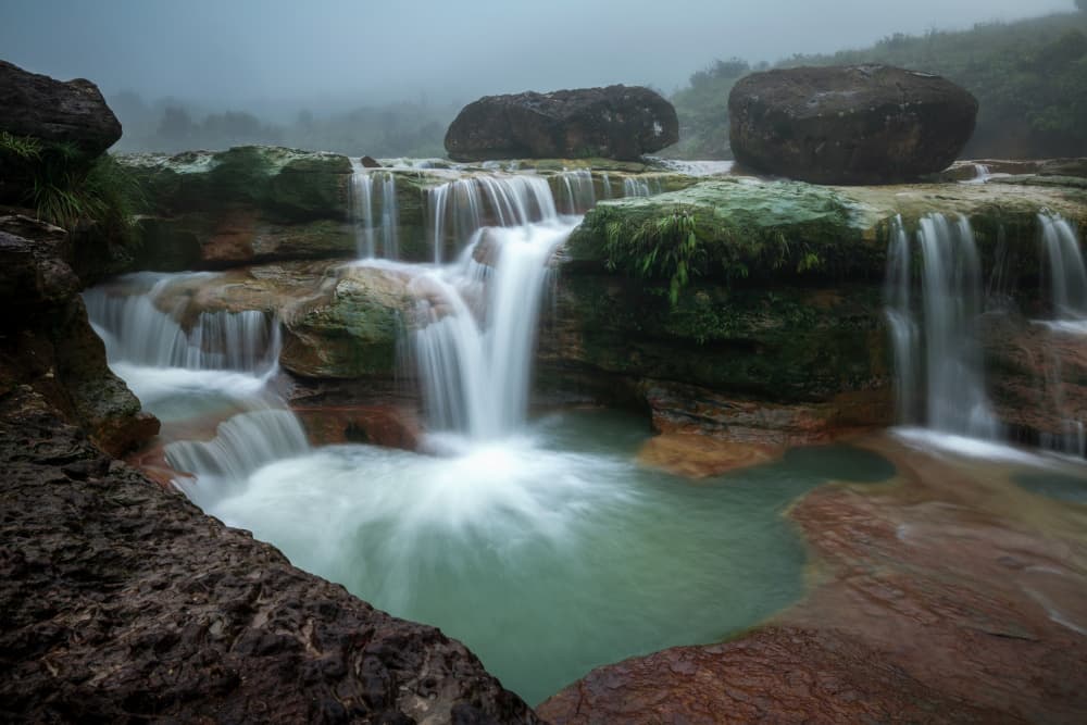 Serene Waterfall Pools by Ramamurthi Palaniraman — canvas wall art