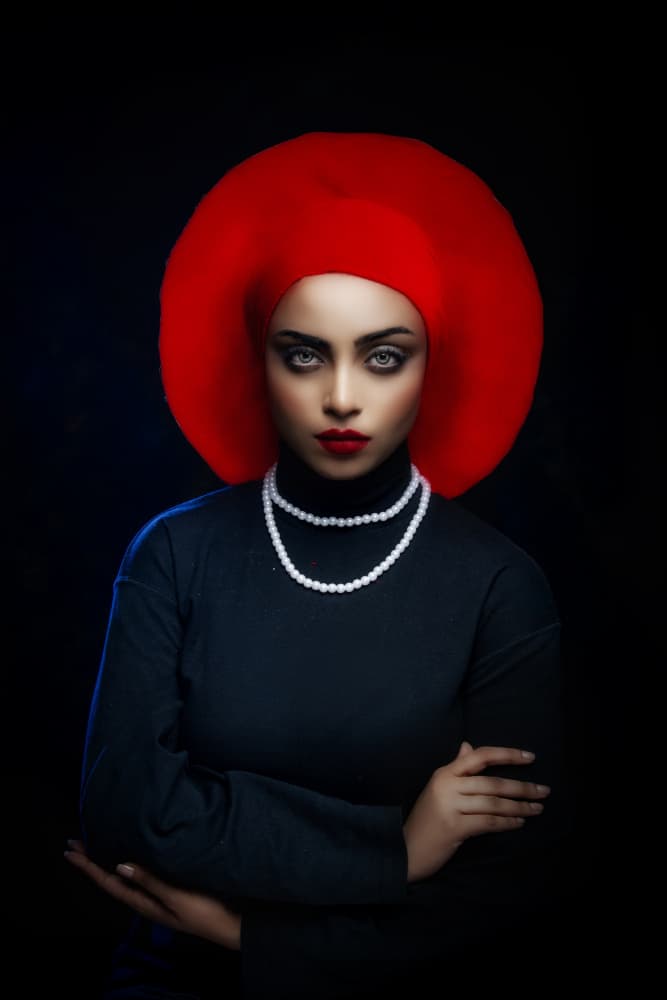 Elegant Red Hat Portrait by PARTHA BHATTACHARYYA — canvas wall art