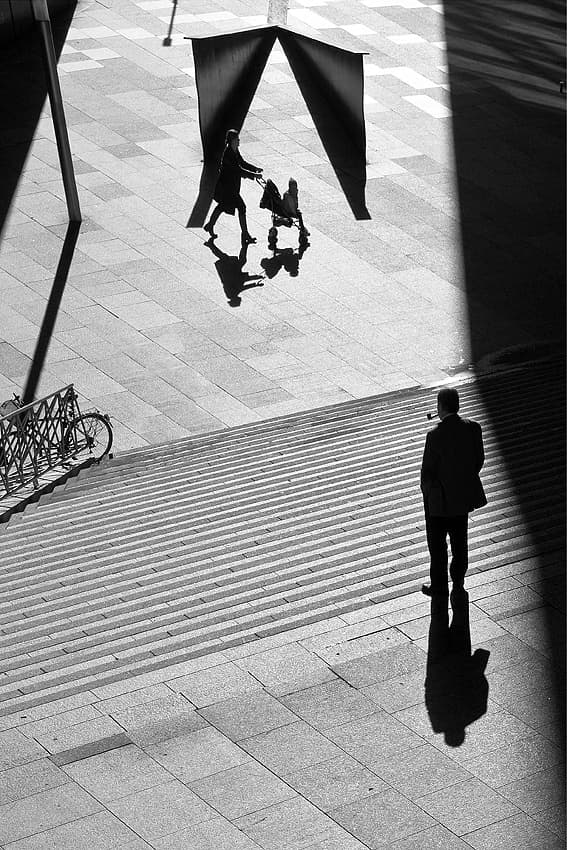 Urban Shadows and Figures by Jure Kravanja — canvas wall art