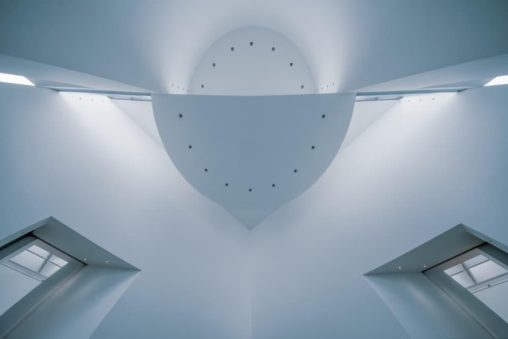 Curved White Interior by Luc Vangindertael (laGrange) — canvas wall art
