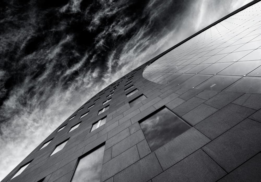 Dramatic Building Sky by Gerard Jonkman — canvas wall art