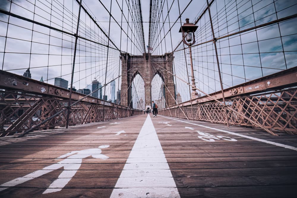 Iconic Brooklyn Bridge Walkway by Marco Tagliarino — canvas wall art