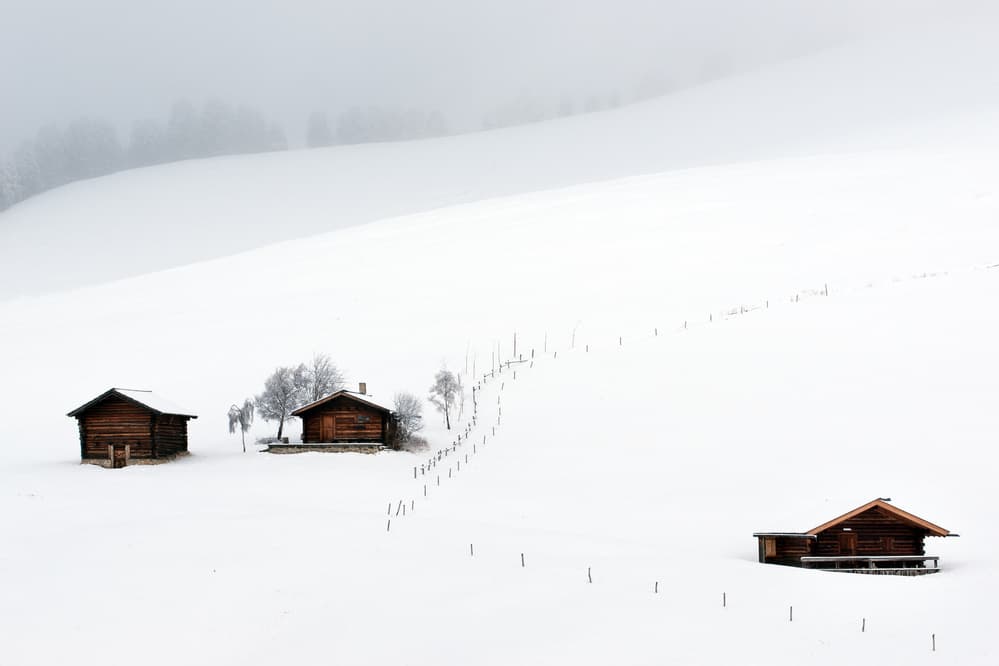 Remote Winter Cabins by Vito Miribung — canvas wall art