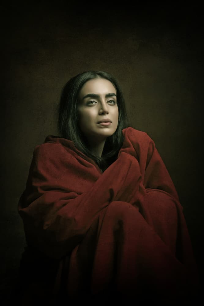 Pensive Red Portrait by Moein Hasheminasab — canvas wall art