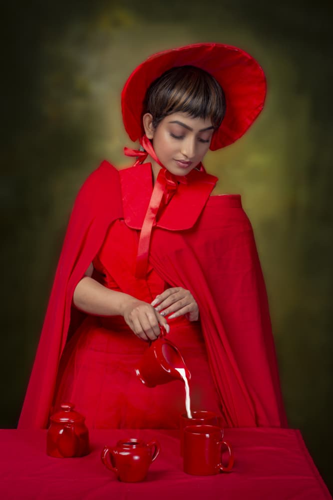Red Cape Milk Pour by DEBASISH CHATTOPADHYAY — canvas wall art