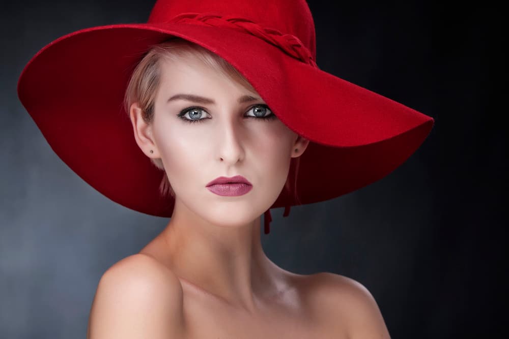 Elegant Woman Red Hat by Hugh Wilkinson — canvas wall art