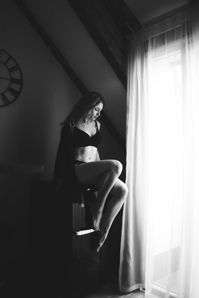 Quiet Elegance By Window by Martin Kolev — canvas wall art