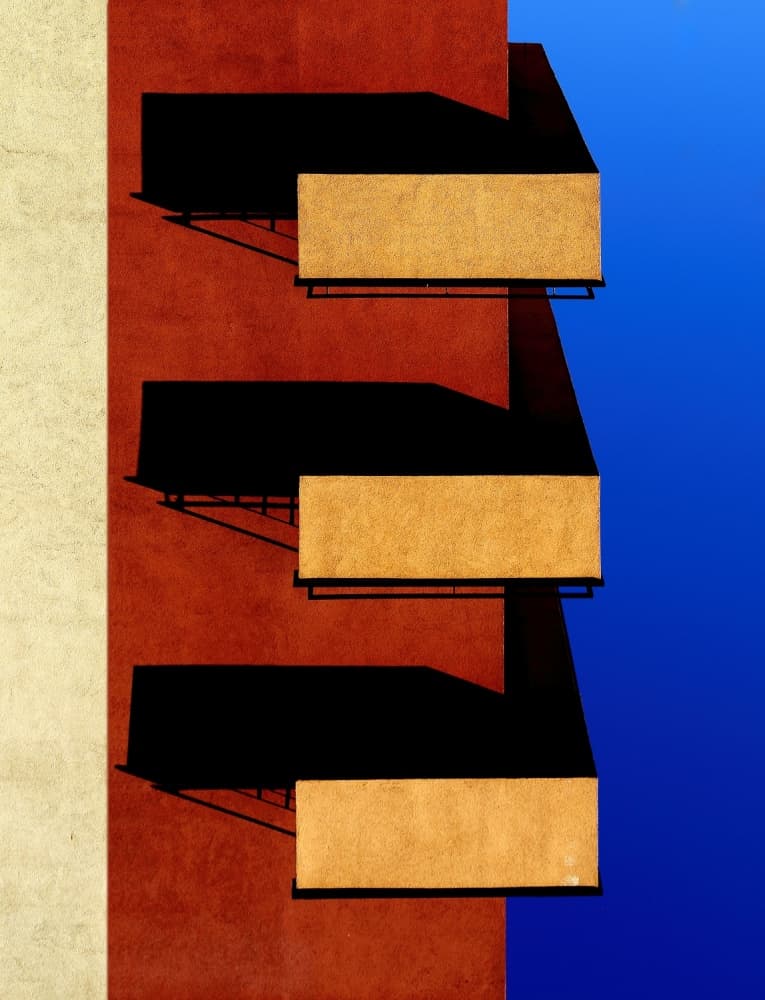 Geometric Balconies Blue Sky by Anna Niemiec — canvas wall art