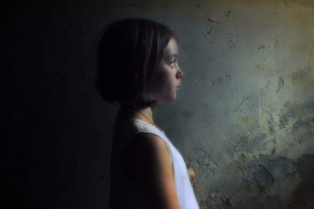 Contemplative Child Portrait by Filippo Manini — canvas wall art