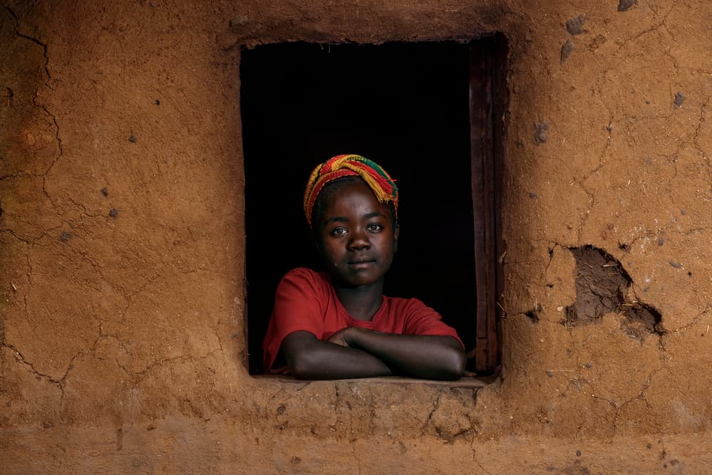 Young Girl Window Portrait by Mohammed Al Sulaili — canvas wall art
