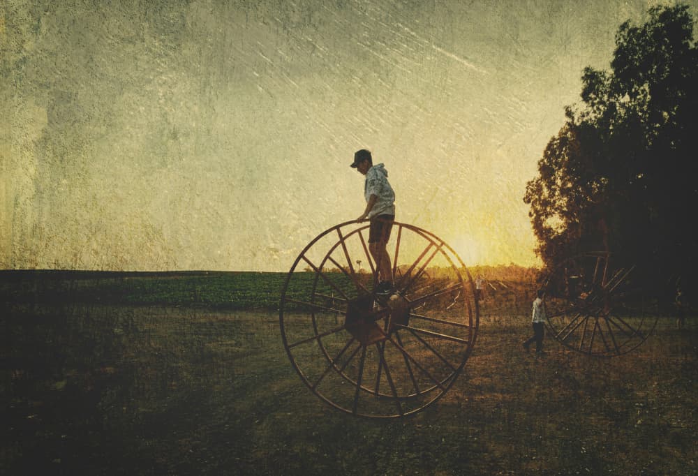 Boy on Vintage Wheel by Rachel Pansky — canvas wall art
