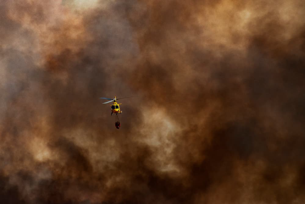 Helicopter Fighting Wildfire by Jose C. Lobato — canvas wall art