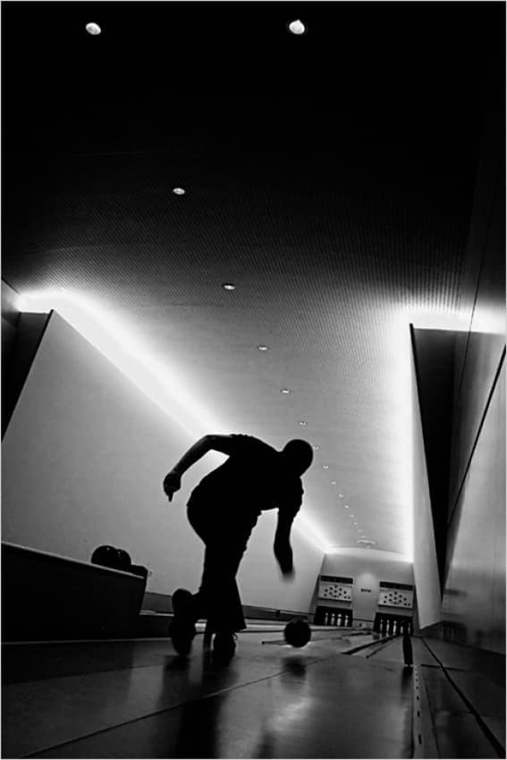 Bowling Action Silhouette by Klaus Ratzer — canvas wall art