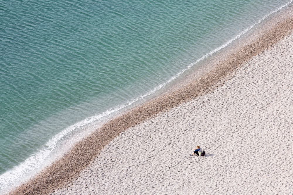 Peaceful Beach Solitude by Benjamine Hullot Scalvenzi — canvas wall art