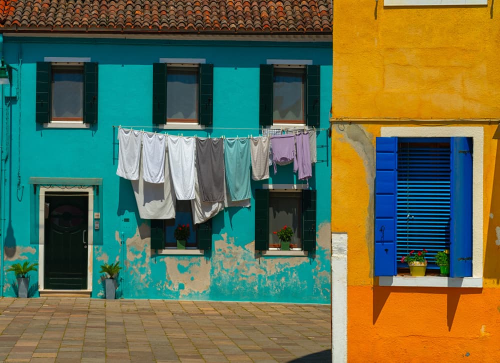 Street colors in Burano by Tommaso Pessotto — canvas wall art