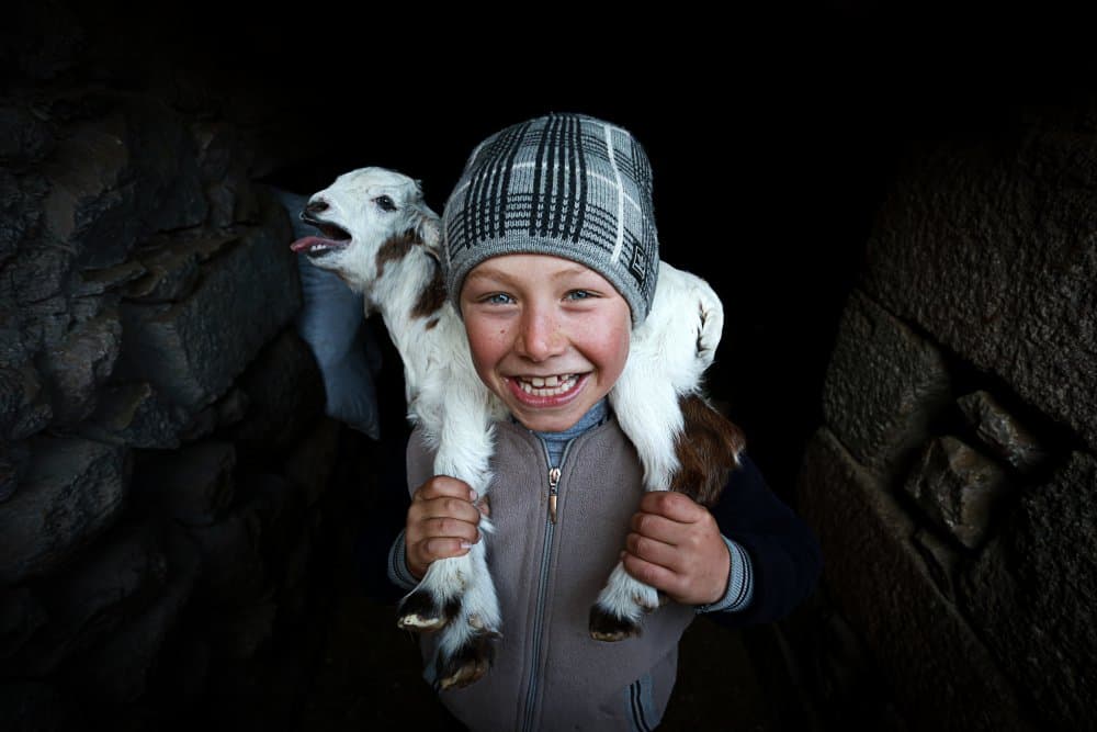 Happy Boy and Lamb by Nazim Tetik — canvas wall art