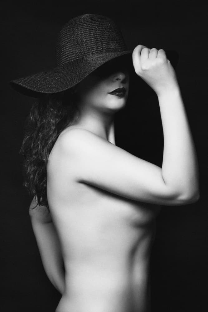Mysterious Woman in Hat by Glamour Studio — canvas wall art
