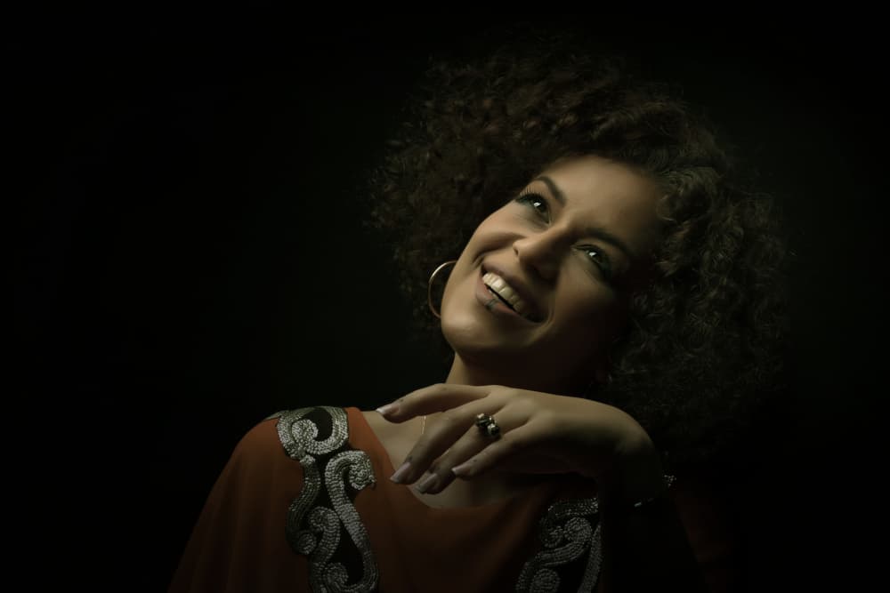 Elegant Woman Smiling by Moein Hasheminasab — canvas wall art