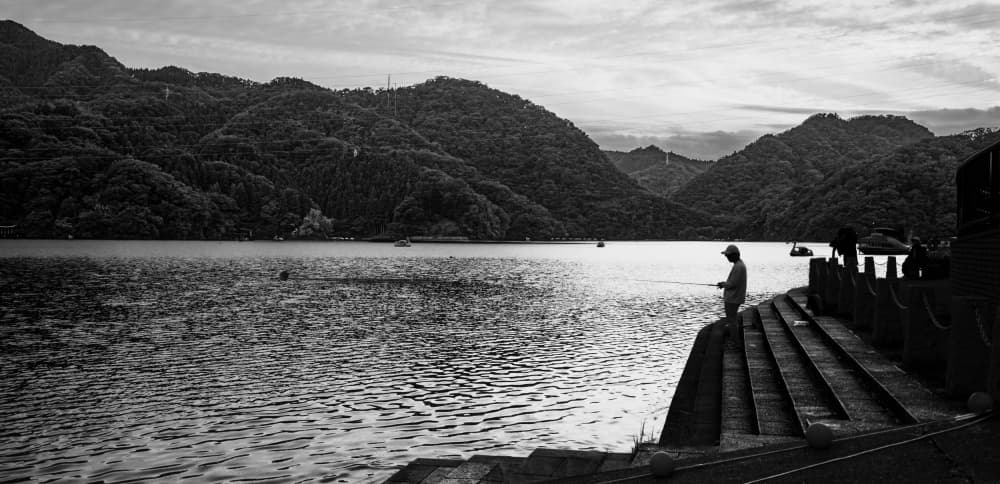 Solitary Lake Fisherman by Satoshi Sakai — canvas wall art