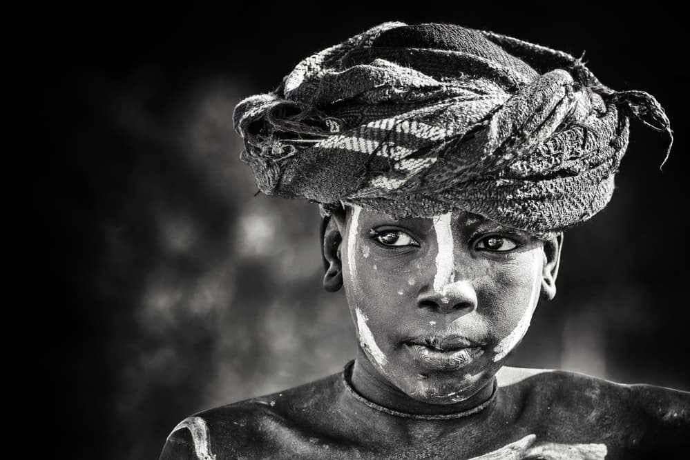 Youthful Tribal Gaze by Piet Flour — canvas wall art