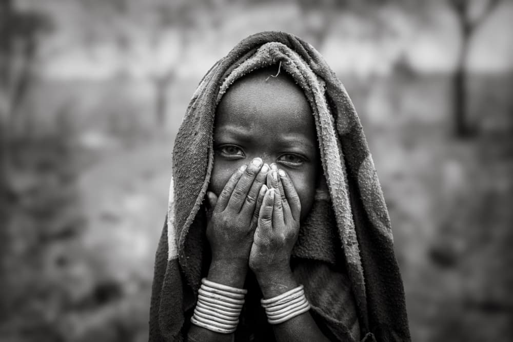 Shy Child's Quiet Gaze by Svetlin Yosifov — canvas wall art