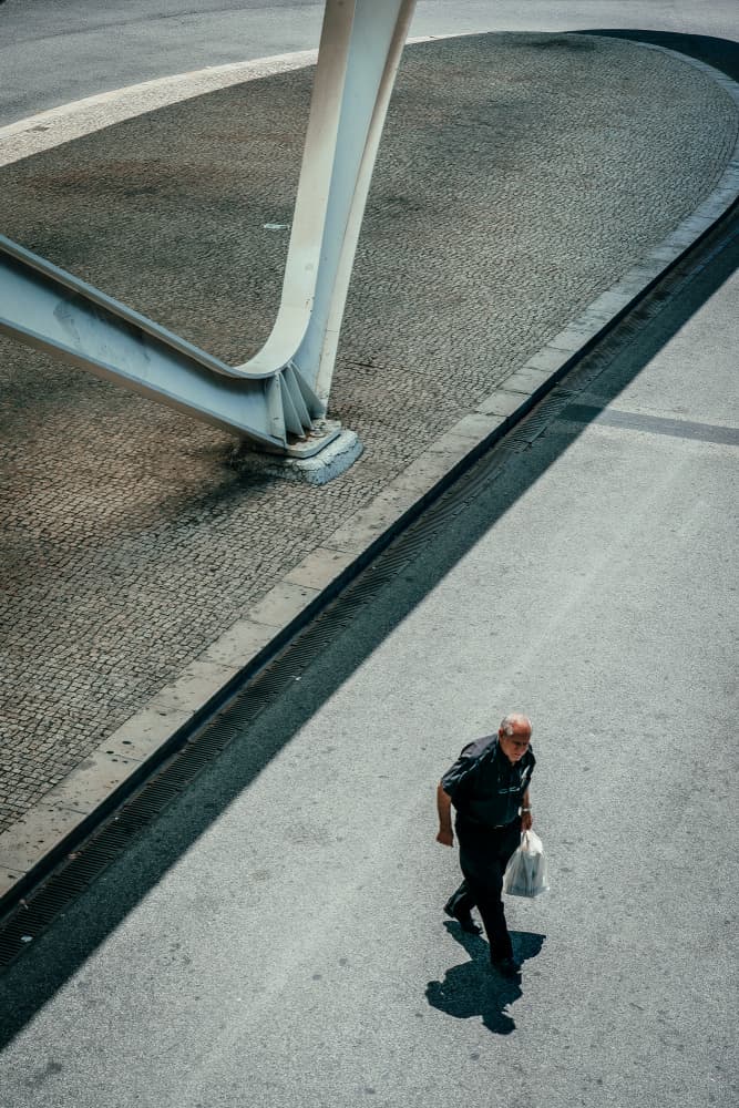 Man Under Architectural Light by Andy Bauer — canvas wall art