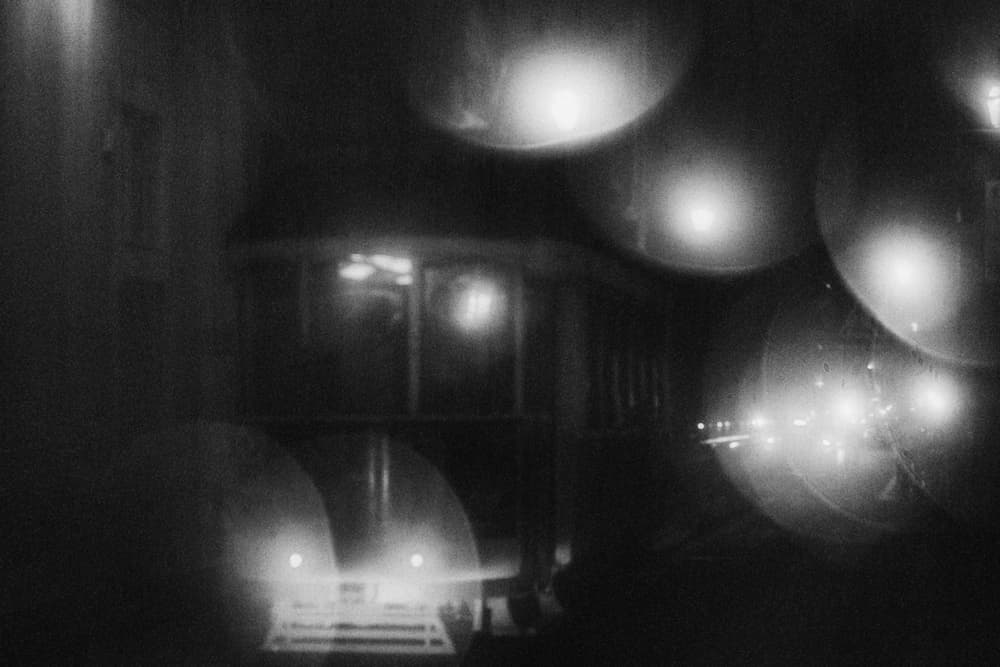 Moody City Lights by Laura Mexia — canvas wall art