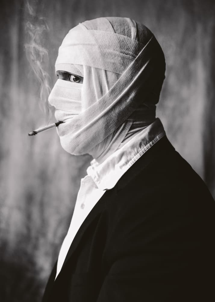 Enigmatic Bandaged Smoker by Tyler McAuley — canvas wall art
