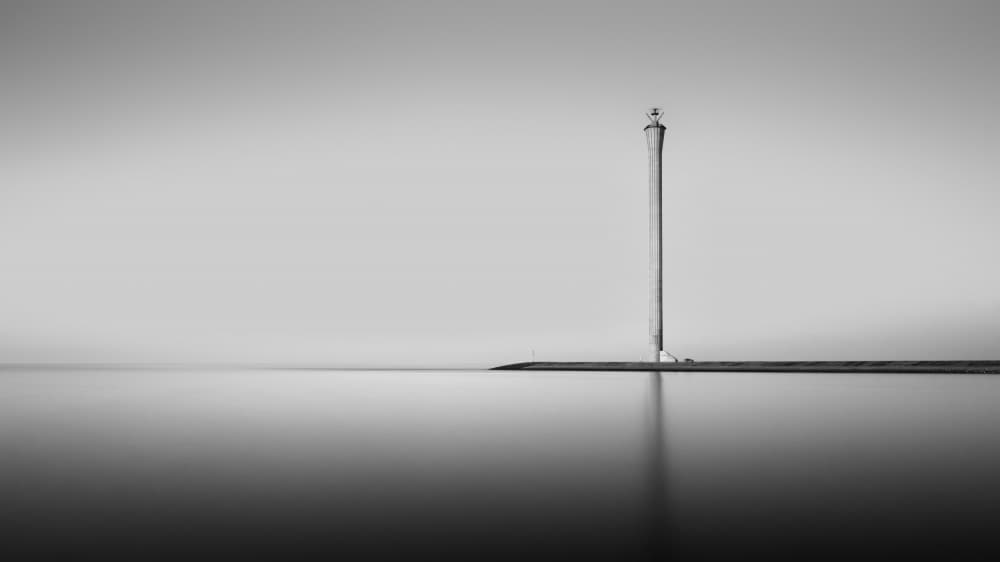 Minimalist Lighthouse Seascape by Tom Vinken — canvas wall art
