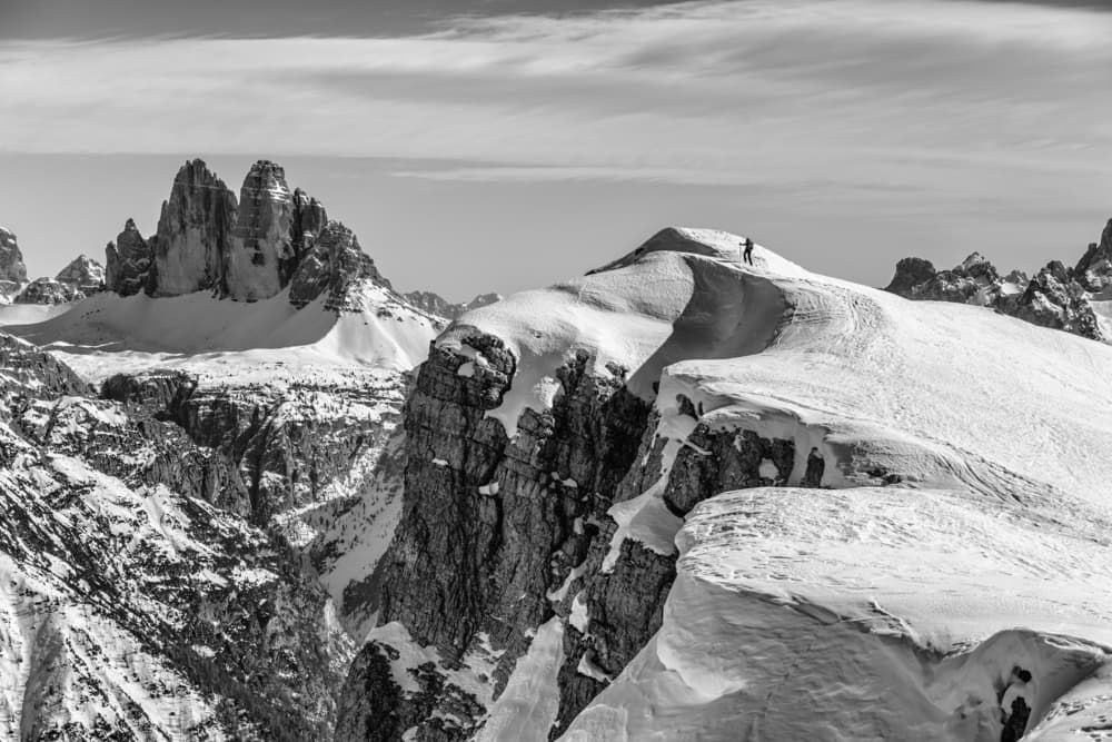Lone Hiker Snowy Ridge by Aleš Klabus — canvas wall art