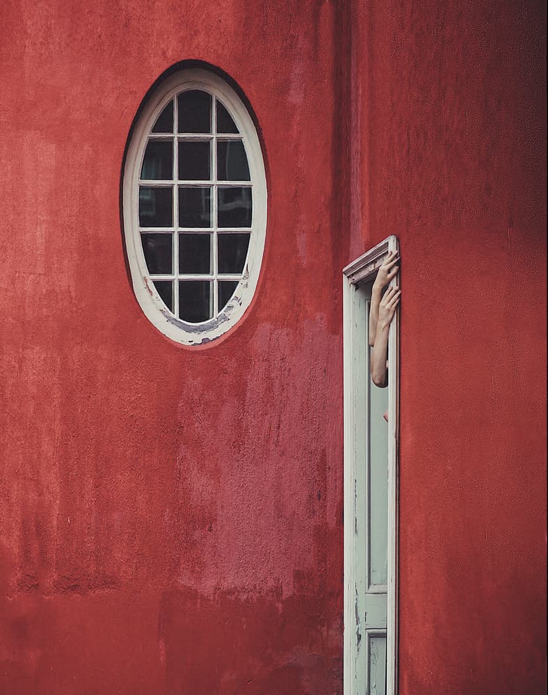 Red Wall Reaching Hands by Kalynsky — canvas wall art