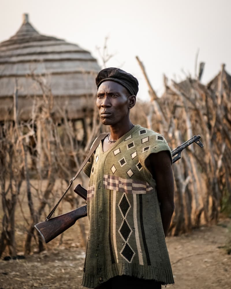 African Village Guardian by Max Vere-Hodge — canvas wall art
