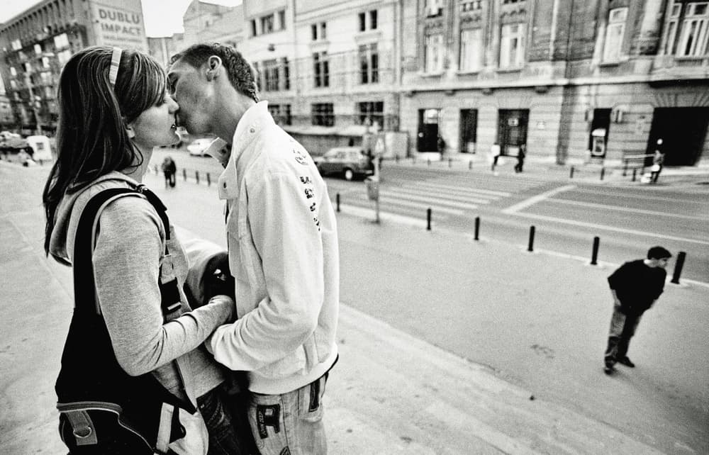 Candid Street Kiss by Vlad Eftenie — canvas wall art
