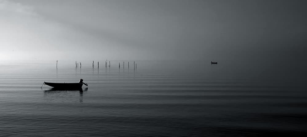 Misty Lake Boat by Ole Nielsen — canvas wall art