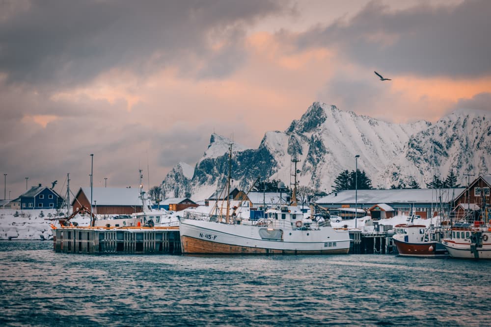 Winter Fjord Fishing Boats by Adrian Popan — canvas wall art