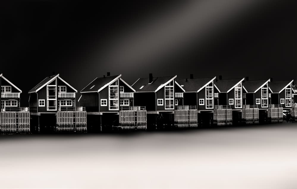 Monochrome Stilt Houses by Peter Futo — canvas wall art