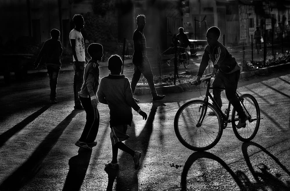 Street Kids and Shadows by Giovanni Cavalli — canvas wall art