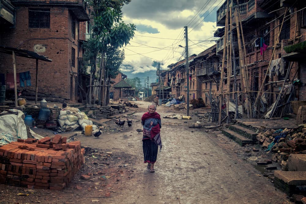 Old Woman Village Street by Haitham AL Farsi — canvas wall art